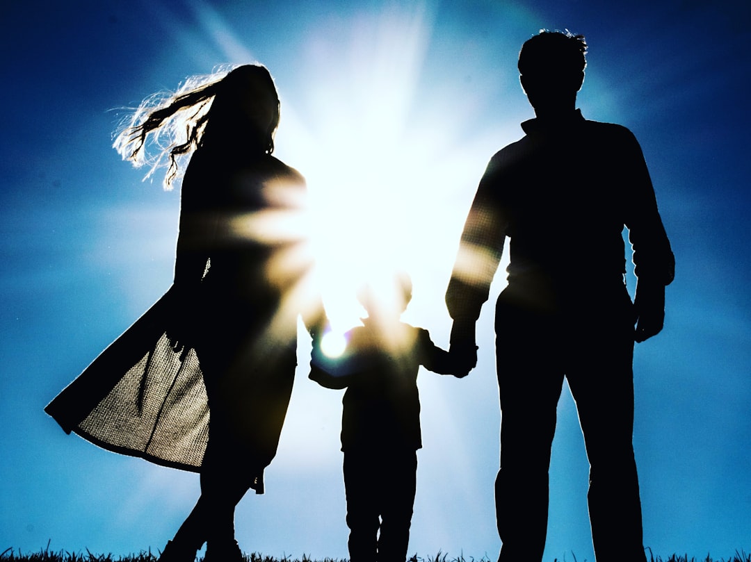 man, woman, and child representing  divorce in California with an amicable agreement by a child custody attorney