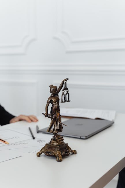 pexels-photo-7876087-7876087 Close-up of Lady Justice statue in an office representing family law practice areas
